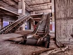 Damaged escalator inside abandoned building Stock Footage