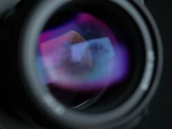 ECU Shot of aperture of photo camera closes and opens during shooting / Germany Stock Footage