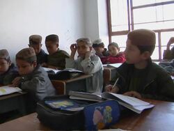 MS Students sitting in classroom / Musa Qala, Helmand Province, Afghanistan. Stock Footage
