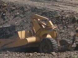 Caterpillar machines on a construction site Stock Footage