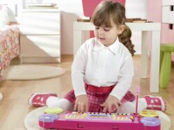 HD DOLLY: Little Girl Creating Music Stock Footage