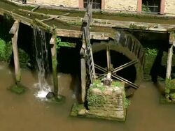 CU Shot of river Leuk with mill wheel / Saarburg, Rhineland Palatinate, Germany Stock Footage