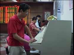 Chinese shares sink 5.4 pct on liquidity worries News Clip