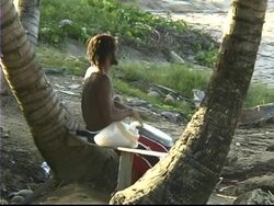 Rasta Drummer on Beach Stock Footage