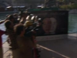 Jean Reno and Abdullah Al Kaabi at the The Philosopher Photocall and Press Conference: 7th Dubai International Film Festival at Dubai .  Stock Footage