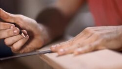 Carpenter draws lines on wooden board with pencil and ruler Stock Footage