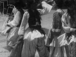 Afghanistan 1945 - Herat Citadel, traditional spinning dance (Attan) similar to whirling dervishes. Stock Footage
