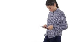 Young woman doing online shopping with the mobile phone. Stock Footage