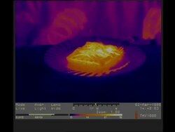 Thermographic imaging, CU hot pie on plate being eaten Stock Footage