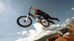 HD Super Slow-Mo: Superman Bmx Dirt Trick Stock Footage