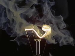 ECU SLO MO Shot of light bulb, showing burning and smoking tungsten wire / Munich, Bavaria, Germany Stock Footage