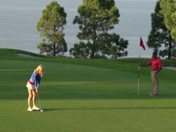 A woman playing golf. - Slow Motion Stock Footage