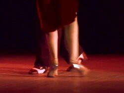 couple feet perform tango Stock Footage