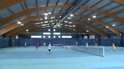 CS Playing Mixed Doubles Game Of Indoor Tennis Stock Footage