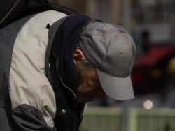 Man Searches in Trash Can - CU Stock Footage