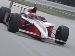   MS POV TS Indy type racing car racing on track / Orlando, Florida, United States Stock Footage