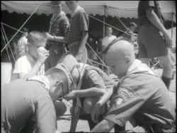 Boy Scouts trade patches at Jamboree City, The Rockies, Colorado. News Clip