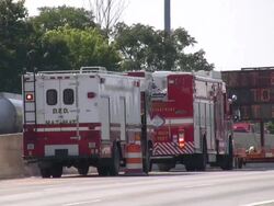 Firefighters, fire trucks on emergency site. Rescue mission, highway accident. Stock Footage