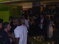 ATMOSPHERE - guests and signage  at amfAR generationCURE Solstice Stock Footage