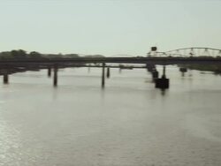 Crossing the Arkansas River - other bridges are seen in the distance Stock Footage