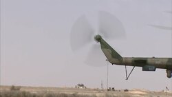 Russian Military Helicopter Gunship Flying Overhead News Clip