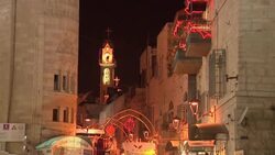 Christmas and Hanukkah lights shine at holy sites News Clip