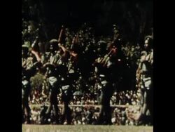 SYND 27 3 77 QUEEN ELIZABETH IS PRESENTED WITH GIRL DANCERS IN PAPUA News Clip