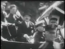 B/W 1927 Charles Lindbergh sitting in car in ticker tape parade / NYC Stock Footage