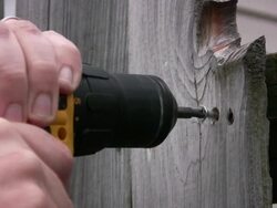 Close-up of drilling a screw Stock Footage