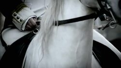 Soldiers in French Revolution uniforms march behind a mounted officer with a bicorne. Stock Footage