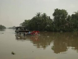 BOAT POV WS PAN Fishing Boat Floating Past / Vietnam Stock Footage