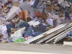 Unloading Waste in a Recycling Center Stock Footage
