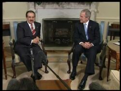 US President Bush meets King of Bahrain, bites Instructional Video