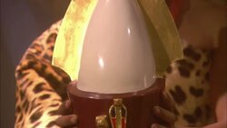 A man wearing a leopard skin robe places a crown on a young pharaoh. Stock Footage