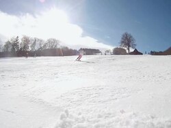 HD SLOW MOTION: Skier Carving And Spraying Snow Stock Footage