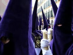 Eye lets of the Hooded Nazarenos parade during the celebration of Semana Santa a Holy week in Malaga Spain, Europe Stock Footage