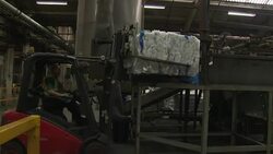 Interior shots of a factory producing plastic refuse sacks from recycled polythene News Clip