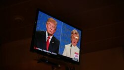 Trump is asked if he'll accept the results of the election. Debate viewers in Indiana react while watching on TV as Donald Trump and Hillary Clinton debate for the third and last time. Stock Footage