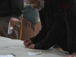 November 2, 2010 ZO Voters from the Arab community signing in to receive their ballots / Dearborn, Michigan, United States Stock Footage