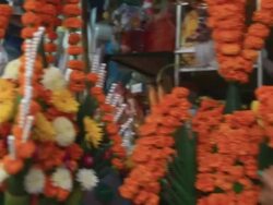MS POV SLO MO Flowers stall at market / Vientiane, Laos Stock Footage