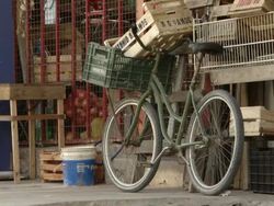MS Shot of junk and cycle at town / Buenos Aires, Argentina Stock Footage