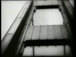 B/W 1940's low angle of bridge supports / Tacoma Narrows Bridge / SOUND Stock Footage