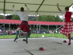 MS Two person Highland Dancing at braemar royal highland games / Braemar, Aberdeenshire, Scotland Stock Footage