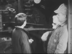 Children look at locomotive train Stock Footage