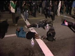 Wall Street protesters in Los Angeles and Philadelphia defied orders to leave their months-old encampments, making it through the deadlines without the acrimony that marked earlier forced evictions in other cities. The AP's John Mone has the story in LA. News Clip