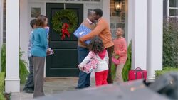 Grandfather hugs son and cracks up with grand-daughter Stock Footage