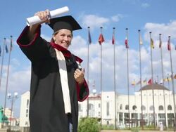 Happy university graduate with a diploma Stock Footage