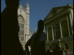 Bath Abbey & Pump House Building, Avon - MS tourists by old stone buildings Stock Footage