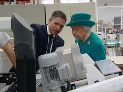 Queen and Prince Philip touring printing press News Clip