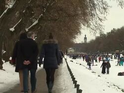 Nymphenburg, walker,  people on frozen river Stock Footage